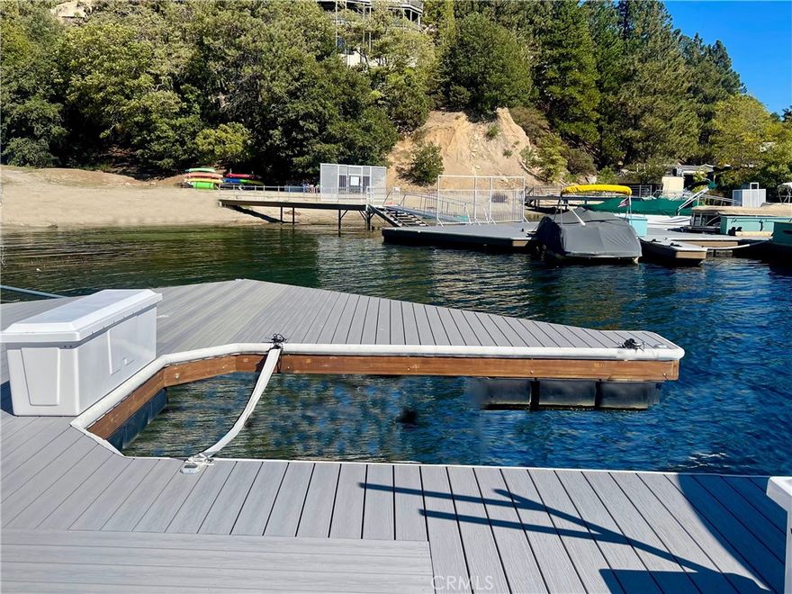 Deep Water Dock right next to Peninsula Park, the beach and rest rooms.  Multiple dock was rebuilt in 2024 with Trex decking, new anchors, new dock boxes, cleats and more.  Large party deck next to the slip.  Secured with two lockable gates.  Great dock captain.  Spectacular views of the fireworks.  Quick walk to the marina store and the Galley Restaraunt.  Easy stroll from the ALA office or stairs from ALA trail #63.  Great views of the entire lake.