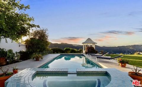 Photo of 16866 Charmel Lane, Pacific Palisades, CA 90272 (MLS # 25623631)