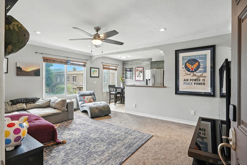 Move-in Ready Top Floor Corner Unit in beautifully-maintained gated community with pool, gym, BBQ area and firepit! This bright and airy 2 bedroom condo has newer Samsung appliances including stacked washer & dryer in-unit that all convey. Brand new ceiling fans in both bedrooms while living room has a newer ceiling fan and a wall A/C. Complex is also VA-approved! The prime El Cajon location puts you at the heart of it all, just minutes from Mission Trails Regional Park and Harry Griffen Park for outdoor adventures, while nearby grocery stores include Vons, North Park Produce, and Babylon International Market, plus easy access to Parkway Plaza with over 170 stores and major freeways for commuting throughout San Diego County. Whether you're a first-time homebuyer, looking to downsize or seeking an investment property, this top-floor corner unit offers the perfect combination of location, amenities and value that won't last long in today's market!