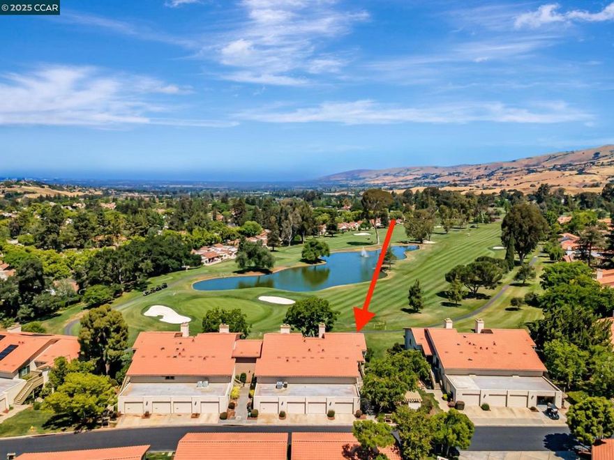 A must see!  Welcome to this beautifully remodeled & turnkey home with SPECTACULAR Views. EVERYTHING IS BRAND NEW INSIDE.  Facing the 16th fairway, situated in a corner unit with no unit above, this stunning condo offers an elevated & unobstructed view overlooking the golf course, lake & mountains. The 2 bds/2 bas, office, PLUS a loft totaling over 1750 sf. provide spacious living. Quality workmanship and tasteful design highlighting: *Engineered wood floor *Open & modern kitchen with upgraded cabinets *Counter depth fridge *Electric oven with air fryer *Fast charging USB outlets *Undercabinet lights *Modern electric fireplace *Dimmer controlled recess lights *High end vanities & bidet ready outlets *Butler pantry/laundry room with a deep sink & quartz waterfall countertop *Attached large finished garage *Bonus Washer, Dryer & Extra New Fridge & much more!  Life inside the Villages Golf and Country Club – a premier 55+ active gated Community with clubhouse/theater/golf course/gym/pools/tennis/bocce/pickleball/hiking trail…where you can enjoy life in a resort setting meeting new friends through its active & vibrant social environment of 70+ clubs & year-round events.  HOA covers Golf Membership, 24 hr. guard, All amenities, Landscaping, Exterior Repairs, Water/Cable plus more.