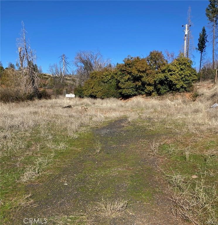 Wonderful opportunity to build your dream home while enjoying a slower lifestyle. There is easy access to this serene 7.75 acre parcel located on paved Big Bend Road. Just minutes above Cherokee. This parcel was previously improved with two single family homes which were lost in the Camp Fire. Truly outdoor living at its best with fishing and boating at Lake Oroville and lots of open space to hike and explore while communing with nature. Just minutes to Highway 70 for commuters to Oroville and Chico. The condition of the well and septic as a result of the fire is unknown. Bring your hiking boots and enjoy all the outdoors have to offer. Rumor has it that is there a natural spring on the property.