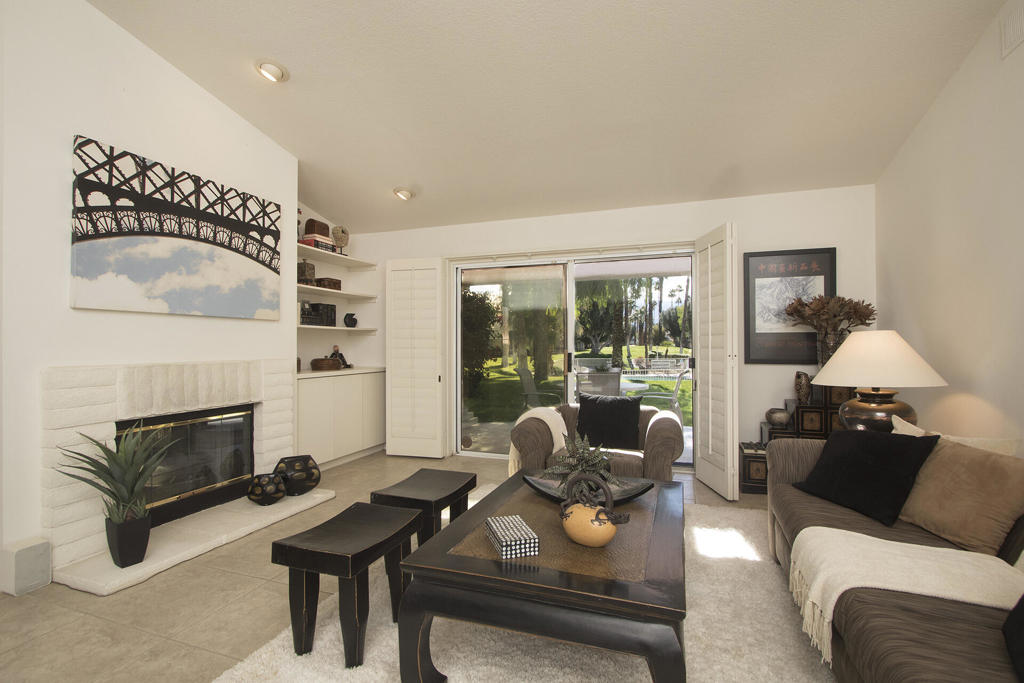 Sought after single-level villa, with a fantastic poolside location! Three bedrooms, two baths + powder room, in a spacious 1,814 SF. Large kitchen with cozy dining nook, vaulted ceilings, walk-in closets and a two car garage are just a few of the features of this home! Amenities include fully equipped fitness center, tennis and pickleball courts, 24 hour security, 32 pools and spas, cable and wi-fi are included and this development has a great location close to dining and shopping!
