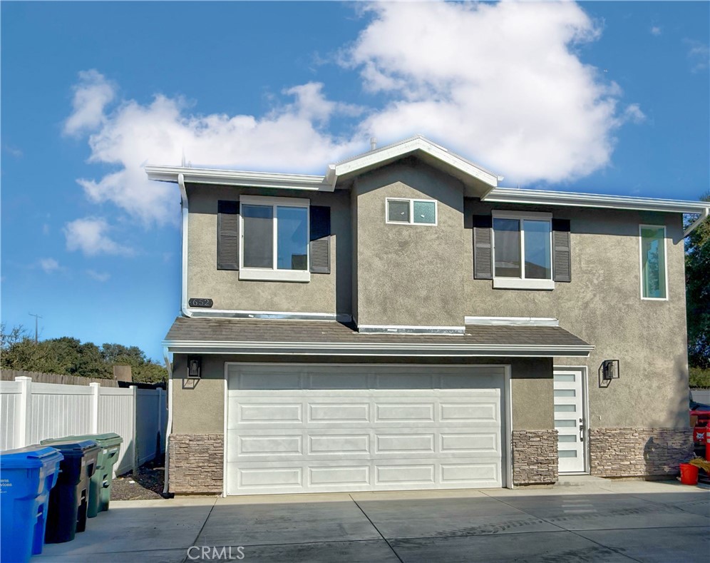 Welcome home to 652 S. Hamilton Blvd, located in the heart of Pomona! This newly built home was just completed this year in 2025! There are 2 homes on 1 lot, this is the second home at the rear of the property. The home itself features: Almost 1100 sf. of living space; 3 bedrooms and 2 bathrooms; Open floor plan with living room, kitchen, and dining area; Balcony over looking the backyard; Attached 2-car garage (laundry area is in the garage). Don't wait to apply, this stunning home won't last long!