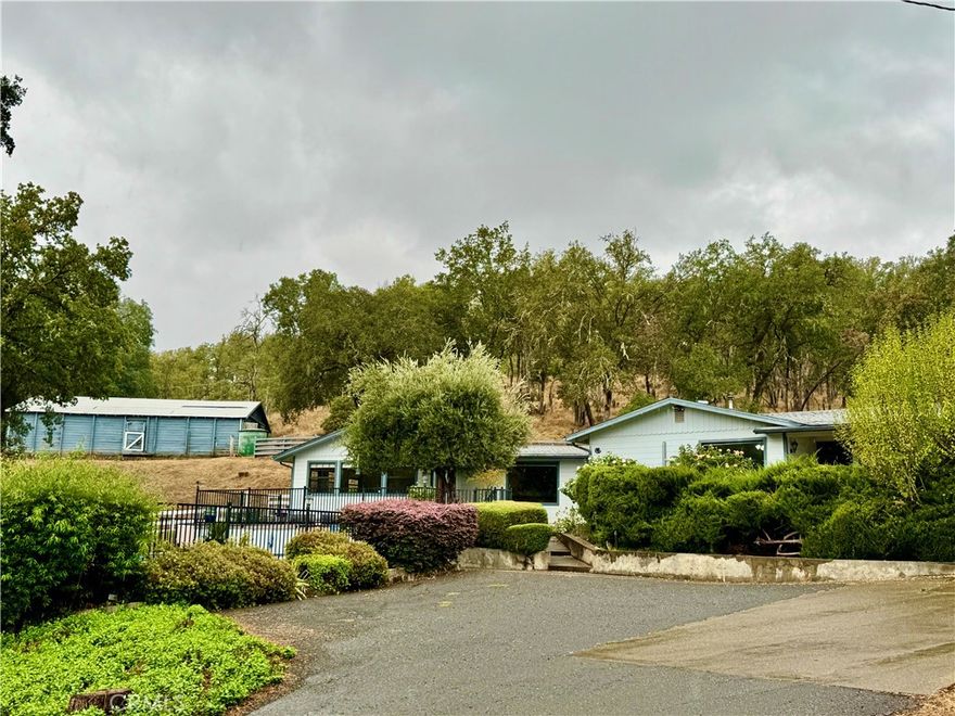 PRIME LOCATION!  Nestled in the heart of serene Potter Valley, you will surely witness the iconic beauty and fall in love with this unique, oak studded 7.5 acre property featuring a +\- 2,066 sq ft. country home surrounded by hills, vineyards and offering ample SPACE, privacy, peaceful setting and HORSE facilities.  Inside you will find a large living room area, country kitchen with tile counters and laminate flooring, 2 bed/ 2 bath and full of country charm.  A surprising BONUS is an incredible built in FULL BAR for ultimate entertaining experiences.  This bar and separate large entertaining room can be accessed by its own entrance or inside the home and may also be used as an office, extra bedroom or family room area.  Outside, find a detached garage and workshop area, covered carport and barn.  Enjoy your coffee under the olive tree and roses overlooking the hills & vineyards from your private front patio.  This home has something for everyone with two fenced gardens, an above ground pool with extensive decking for a great outdoor entertaining spacel and ideally situated in a peaceful country setting but easy access to Ukiah, Willits and surrounding areas.  BRING the horses!  You will find fenced horse arena and barn on site.  Potter Valley features rolling hills and lush forests.  The Russian River flows through the area, providing an ultimate outdoor adventure with so many possibilities for kayaking, fishing, scenic picnics and snow covered hills from the Mendocino Forest.  The quaint downtown area features local culture, small shops and friendly faces.  Home is being sold AS IS.  Buyer is to confirm all lot lines & utilities.  You don't want to miss seeing this distincitve opportunity.