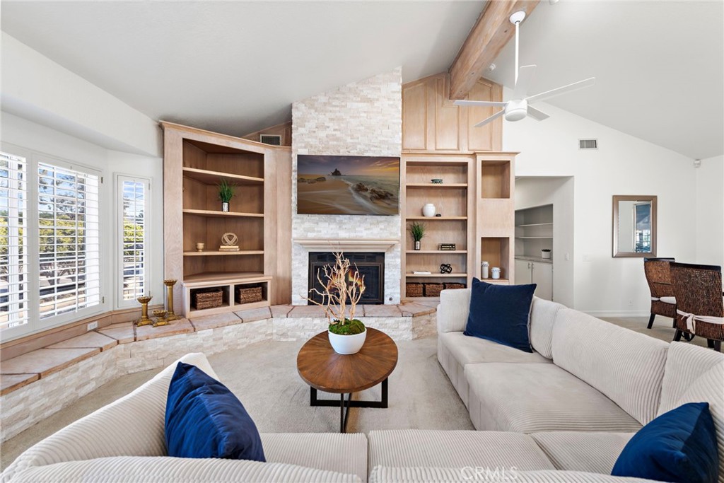 Stunningly remodeled 4 bedrooms, 2,300 sq. ft duplex with 2 car garage. FULLY FURNISHED AND EQUIPPED! Just 1 block to Corona del Mar Beach, 2 blocks to Corona del Mar Village, and 1 block to Bayside Park. Highly coveted location above Bayside Drive. Spacious gourmet kitchen with large island, subzero refrigerator, pantry, warming oven and garden window. Inside laundry. Central air conditioning, vaulted ceilings throughout, 2 fireplaces, 5 ceiling fans, 4 sets of French doors, large wet bar, 8 skylights, huge 17 x 20 primary bedroom with stone fireplace, bay window, large 9 x 10 walk-in closet, whirlpool tub and separate shower. Large patio deck with view of trees and city lights. Quiet cul-de-sac with greenbelt area and adjacent stairway to the village. Short walk to everything!