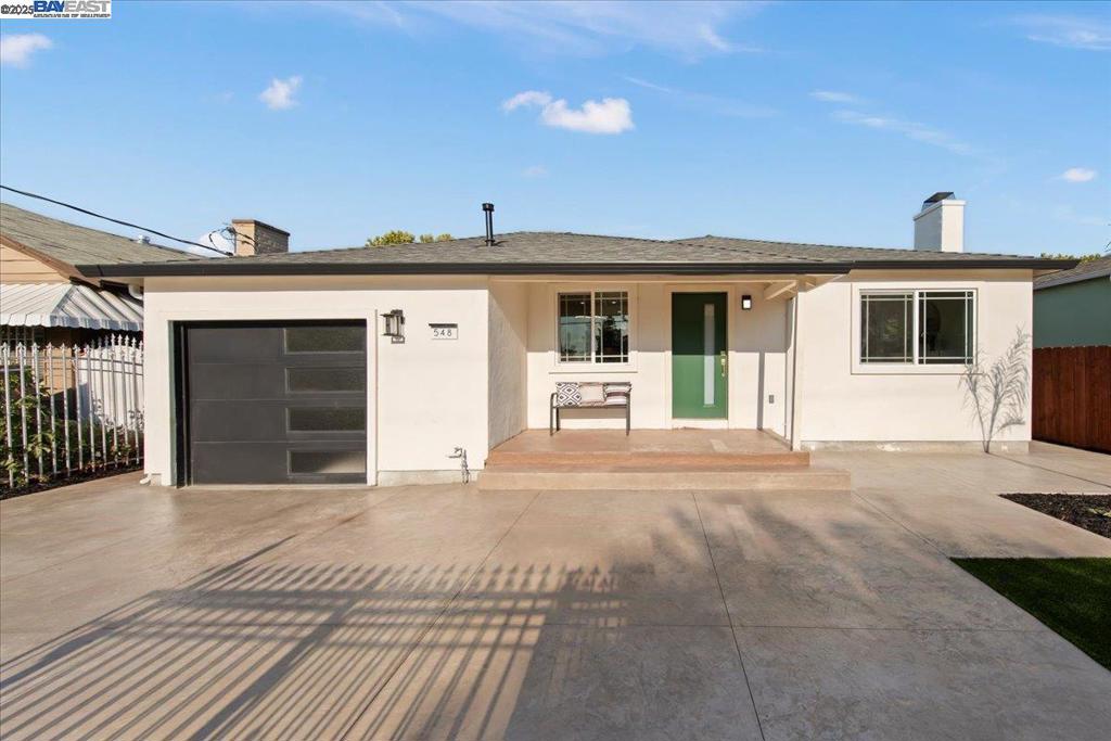 This 3-bedroom, 2-bathroom home offers a bright and airy living space, situated on a spacious lot in the lovely El Sobrante Park Community of Oakland. Boasting fantastic curb appeal with a meticulously landscaped front yard, this residence features a stunning gourmet kitchen with new white sleek cabinets, custom porcelain countertops, and high-end appliances. The hallway bathroom is beautifully appointed with imported porcelain tile, and a walk-in shower,. The spacious master bedroom includes a luxurious en suite bathroom with a walk in shower, and high-end finishes. The large family room is perfect for gatherings, featuring a sleek wood burning fireplace with modern tile and custom mantel, With numerous upgrades throughout, lush green landscaping, and easy access to Highway 880/580, BART, Oakland Airortl, dining, parks, and Easy Commute to any part of silicon valley and City, this home combines comfort and convenience in a highly desirable location.