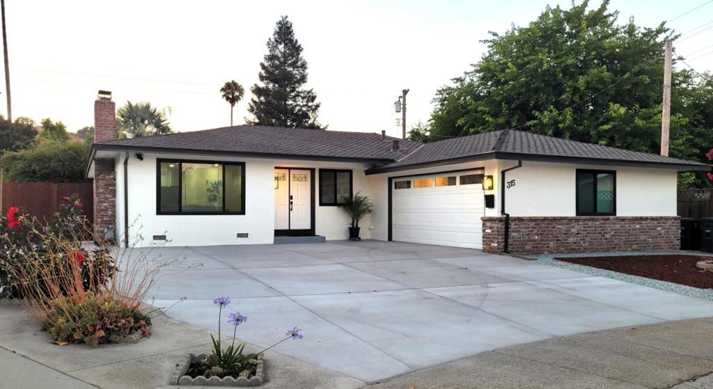 Welcome to this charming 3-bed, 2-bath home located in a great established northwest neighborhood in Morgan Hill, just a few minutes from its attractive downtown. Offering 1,462 square feet of living space, this turn-key residence is designed for comfort and functionality. The open plan flows seamlessly to the backyard through the living room, breakfast nook, kitchen and dining area. The kitchen is well-equipped with top brand stainless steel appliances, and designing cabinets and counter tops. The recently updated bathrooms have marble double vanities and full size LED mirrors. The home features waterproof laminate and porcelain floors, providing a sleek and easy-to-maintain surface. The cozy fireplace, and the convenience of the central AC and heating system guarantee enjoyment all year around . The property's energy efficiency is enhanced by double pane windows, tankless water heater system, low maintenance landscaping, and fans in all rooms. The laundry area on the oversize attached garage includes the convenience of a utility sink. Gardening and outdoor lovers will be delighted with the backyard, which has a 100 feet long planter box with full sun exposure, irrigation control and rain sensor, in addition, to parking for a large vehicle or boat parking. A must see!