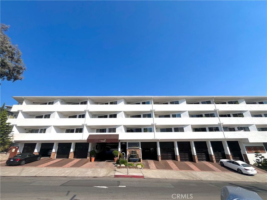Located in the heart of Laguna Beach this is a spacious 2 bedroom, 1.5 bath condo style unit with lots of upgrades. This unit has many custom features...hardwood floors, custom granite kitchen, mirrored wardrobe closet, huge master bedroom walk in closet, private balcony with ocean view, recessed lighting throughout, crown and base molding, European bathroom with Murano glass sink, lots of windows, beautiful community sundeck! Right across the street from downtown Laguna Beach, two blocks from main beach, close to Restaurants, and Art Festivals. Two tandem parking spots available for $195/ month.