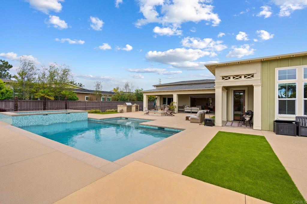 Just REDUCED $3,995,000 **motivated sellers Nestled in the heart of coastal Encinitas, 956 Urania Avenue is a custom-built modern sanctuary that seamlessly blends luxury living with the relaxed California lifestyle. Located just minutes from world-renowned beaches and the vibrant downtown corridor, this stunning residence is tucked away in a quiet, gated enclave—offering the ideal balance of privacy and convenience. Thoughtfully designed with high-end modern upgrades throughout, the home lives like a single story, with the exception of a spacious attached ADU located above the garage. The large flat lot offers endless fun and entertainment with a large solar heated pool, large spa, half sports court, built-in BBQ, and covered patio. The front yard also offers an extended paved driveway, including RV parking, and electric car charger. That dreamy San Diego indoor-outdoor living is at its finest here, with open-concept spaces that flow effortlessly to the resort-style backyard—perfect for pool parties, entertaining, or simply soaking in the sun. Location, luxury and lifestyle, 956 Urania is more than just a home. You won’t want to miss it.