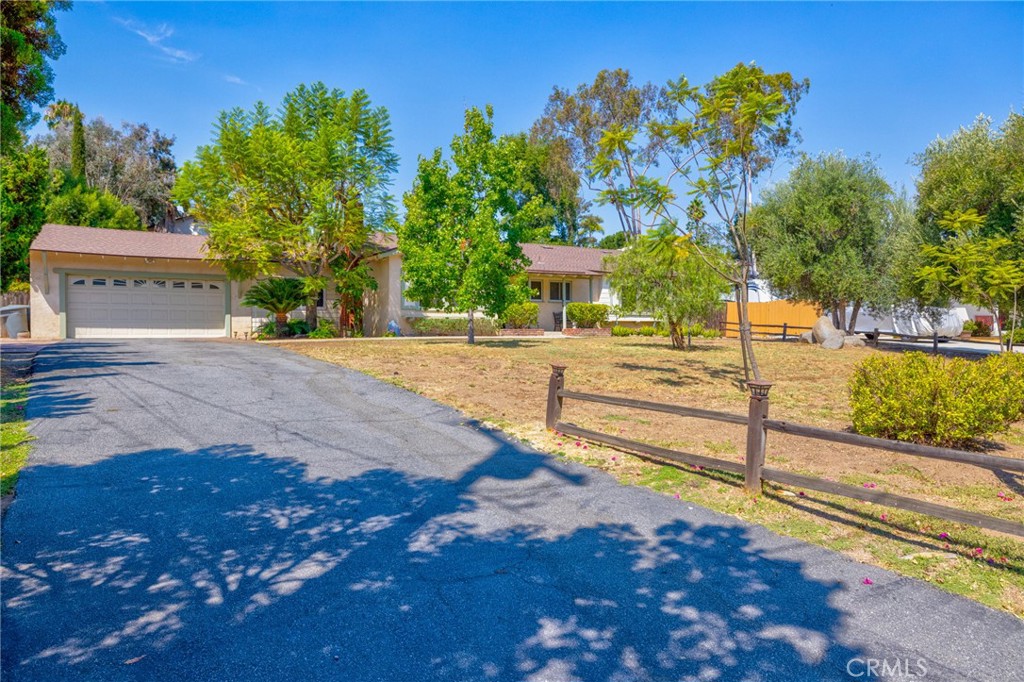 Welcome to 2055 Vermel Ave, Escondido, CA 92029 — a charming 3-bedroom, 2-bath home with a den in one of Escondido’s most desirable neighborhoods. This property offers a rare opportunity with its attached casita, ideal for generating rental income, accommodating extended family, or creating a private guest suite. The main home features a versatile layout filled with natural light, including a spacious den that can be used as a home office, media room, or additional living area. Step outside to a large backyard, offering plenty of room for expansion, outdoor entertaining, or even your dream pool. With excellent freeway access, you’re conveniently connected to shopping, dining, schools, and entertainment, all while enjoying the peace and comfort of a well-established community. Whether you’re looking for income potential, multi-generational living, or space to grow, 2055 Vermel Ave is the perfect place to call home.