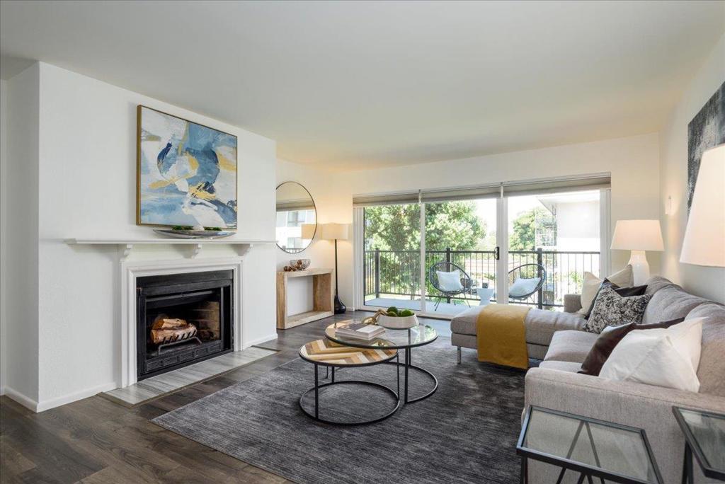 Come see this rarely available 3-bed, 2-bath condo spans nearly 1,500 sq ft on one level. Offering one of the largest and most desirable floor plans in the community. This freshly painted and updated unit offers all the benefits of a single-family home along with the convenience of a condo lifestyle. You don't need to choose between space and convenience at The Cherry Villas. Step inside and feel the difference. The bright, open-concept living space is perfect for entertaining, with a wood burning fireplace and direct access to a large patio for indoor-outdoor living. The primary suite is your personal retreat, complete with huge closets and a beautifully updated ensuite bath with dual sinks. Life is easier here. Enjoy the convenience of a true laundry room with included full-sized, washer and dryer, tons of storage, and two garage parking spaces. The newly constructed patio and railings and the building is freshly painted with new awnings. Tennis courts and pool are not operational. Walk to YouTube or Walmart HQ. Grab groceries at Mollie Stones in Bayhill Shopping or enjoy the local restaurants. Hop on BART or CalTrain just blocks away & highways 280, 380, & 101, and close to Biotech companies, SF, Silicon Valley, & SFO. Its your launchpad to everything the Bay has to offer.