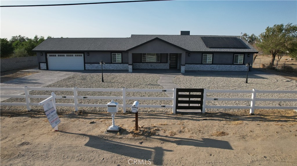 BRAND NEW 2025 CUSTOM HOME! DEFENITELY A MUST SEE!! This gorgeous 1853 Sq Ft. stylish Modern Ranch home is totally upgraded featuring 4 spacious bedrooms and 2 amazing custom bathrooms with tile in showers as well as a good size laundry room and an oversize 672 Sq. Ft. Garage. The 207 Sq. ft. front porch entryway leads you into an open floor plan with a big living room with beautiful wall moldings and a stunning dining room and gorgeous kitchen with quartz countertops and stainless steel appliances which promise reliability and efficiency for all your cooking adventures. This immaculate property also features a fully paid Solar and Battery System, custom doors, LED lights throughout, vinyl fencing, stamped concrete driveway and walkway around perimeter, recessed lighting, and ceiling fans in every bedroom. Located in a serene neighborhood, this modern ranch promises a blend of tranquility and convenience. Absolutely too much to list.... Don't miss this opportunity!