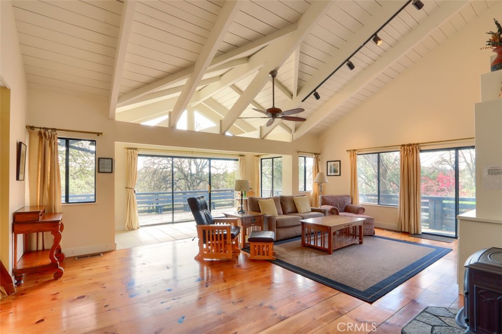 Stunning Architectural Gem – Minutes from Yosemite | Active Short-Term Rental
Discover your dream retreat just 45 minutes from the El Portal entrance of Yosemite National Park! This captivating 2-bedroom, 2-bath home with a charming sleeping loft offers a unique blend of modern comfort and natural beauty—an ideal haven for guests seeking a serene escape or an adventure-filled stay.
Nestled on 8 private acres adorned with mature oak trees and blooming perennials, the property exudes tranquility and space to roam. Step inside and be wowed by soaring ceilings, abundant natural light, and striking architectural details that set this home apart.
The spacious great room is designed for gathering, featuring an open-concept kitchen that allows the chef to stay connected with guests—perfect for entertaining after a day of exploring the park. Whether it's quiet mornings on the deck, evenings under the stars, soaking in the hot tub or cozy nights around the table, this home is a proven favorite among short-term rental guests.
A true turnkey opportunity—continue the successful rental operation or keep it as your personal Yosemite getaway.