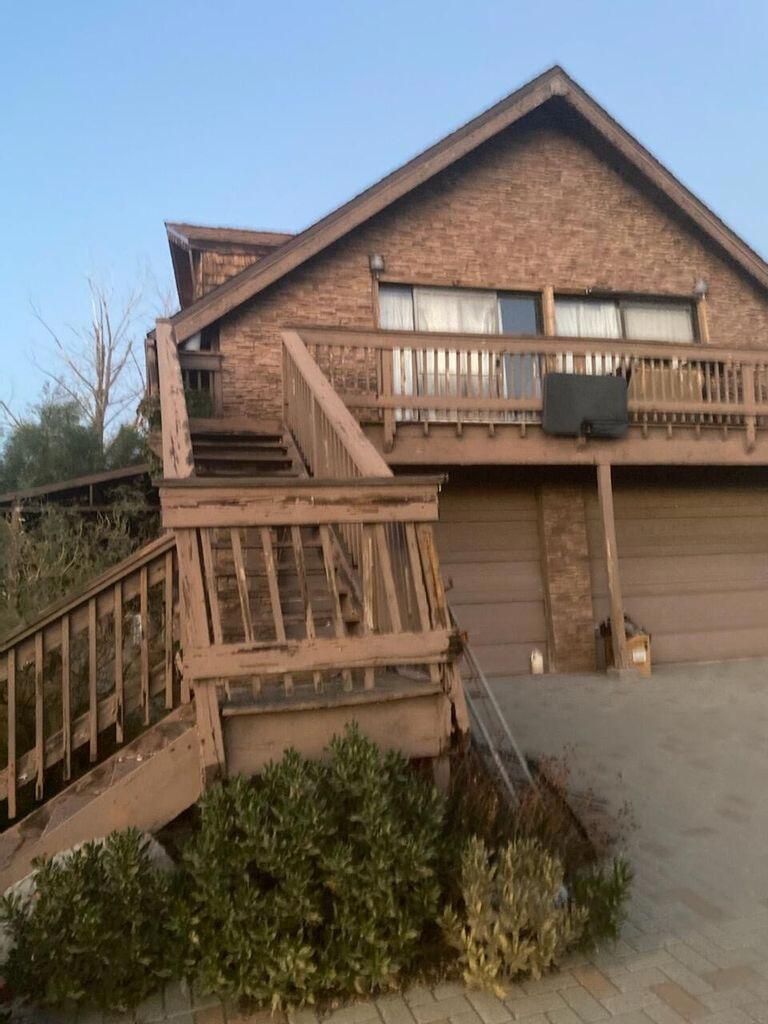 HANDYMAN SPECIAL!Unique 2-Story idyllic ranch style spacious farmhouse with an open floor designed for entertaining, nestled into the Majestic Santa Rosa Mountain Range above the desert cities with amazing views. 4 spacious bedrooms, 3 baths, 2 fireplaces to add warmth and charm, den/family room, stone tile flooring and kitchen counter tops, above ground pool (not working) 3 car garage and horse stalls area. Don't miss this opportunity to transform this property into your cozy mountain retreat. This fixer upper needs TLC