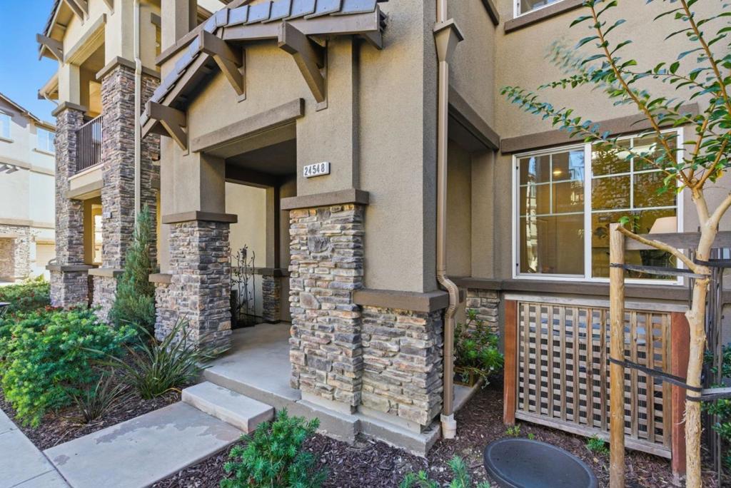 Welcome to 24548 Autumn Mist Way, Haywardan elegant, modern sanctuary. This exquisite three-story townhouse, built in 2019, offers 1,812 square feet of refined living space. With four spacious bedrooms and three and a half bathrooms, its designed for those who appreciate sophistication. High ceilings and a sunlit living area with a cozy fireplace create an inviting ambiance. The contemporary kitchen features a central island, sleek gas oven, and granite countertopsperfect for culinary enthusiasts. The primary suite is a luxurious retreat with a jetted tub and walk-in closet. Amenities include air conditioning, an attached two-car garage, guest parking, and in-unit laundry facilities. Enjoy a private patio for entertaining. Conveniently located minutes from the BART station and major freeways, this home suits commuters and outdoor lovers alike. The homeowners association manages common areas, allowing you to enjoy a lifestyle of ease. Experience modern elegance at 24548 Autumn Mist Way.