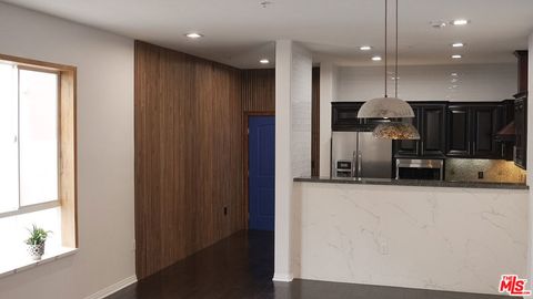 Photo of 3750 W Santa Rosalia Drive #214, Los Angeles, CA 90008 (MLS # 26832603)