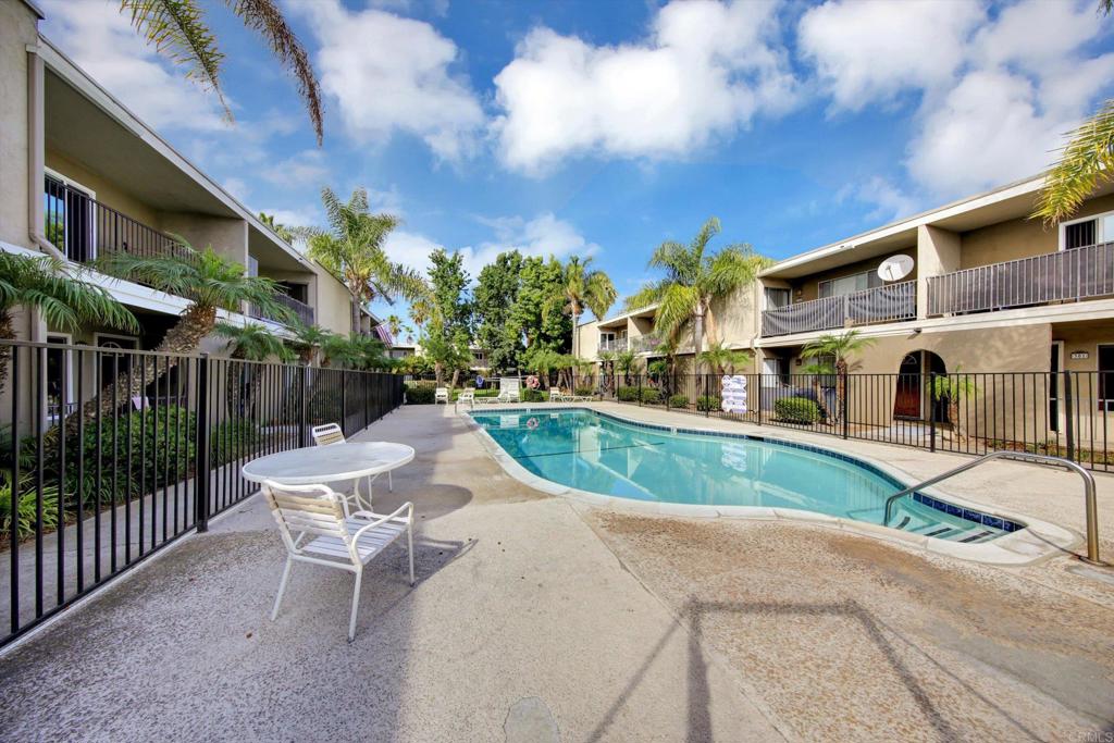 Welcome to this VA-approved 2 bedroom / 2 bathroom first-floor condo offering 1,004 sq ft of comfortable living with no stairs to climb. Step inside to find a bright, open layout featuring granite countertops, stainless steel appliances, and in-unit laundry for everyday convenience and a spacious patio that invites refreshing breezes. Both bedrooms are generously sized, with the primary suite boasting ample closet space and an ensuite bath. An additional highlight is the walk-in 9’ x 4’ storage room - a rare nearby bonus that adds incredible functionality. This well-maintained gated community offers residents a sparkling pool, two assigned parking spaces, and low HOA fees that include hot water. Perfectly situated, you’ll be walking distance to elementary, middle, and high schools, with Sharp Chula Vista Medical Center, Costco, Walmart, Target (just 2 miles), and the beach (6 miles) all within easy reach. Commuters will appreciate the quick access to freeways, while outdoor enthusiasts can enjoy nearby parks and the new Loma Verde Recreation and Aquatics Center. Whether you’re a first-time buyer, downsizing, or looking for a great investment opportunity, this ground-floor condo offers the perfect blend of comfort, convenience, and value.