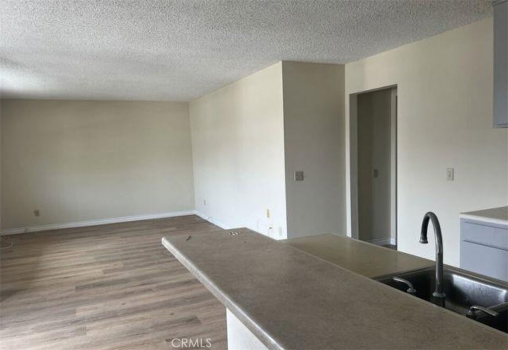 Well maintained apartment in a desirable location. This move-in-ready unit features 2 bedroom and 2 bathroom, offering comfort and convenience. The apartment has laminated flooring throughout and is currently vacant, making it perfect for tenants needing immediate occupancy. Sorry, NO PETS.