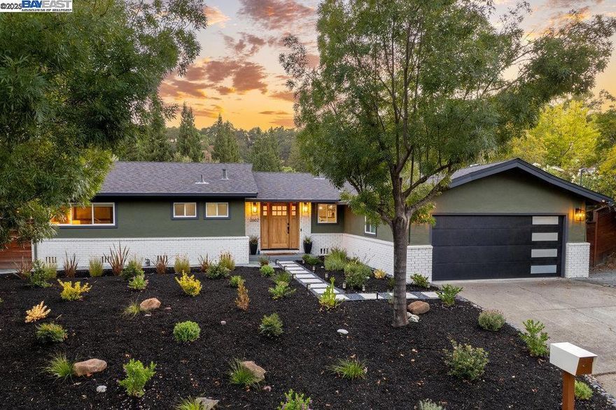 Perched above Reliez Valley in Lafayette's desirable Walnut Hills Country Club Estates, this single story home has been meticulously transformed to offer a like-new living experience with breathtaking wooded hillside views. Step through the hand-crafted solid mahogany front door into a sun-filled, open-concept floorplan. Refinished white oak floors flow through the living & dining areas to a sparkling eat-in kitchen with new LG stainless steel appliances and a striking concrete island with seating for five. Each bathroom has been completely remodeled w/high-end finishes. Relish in the expansive yard w/ patio & grassy areas, play area, fire pit & "cowboy" pool, perfect for taking a dip to cool off on the warm Lafayette days. The commitment to quality is evident in new Simonton windows, custom trim work throughout, owned solar NEM 2.0. Newer fencing, new roof, & new sewer lateral. Significant structural upgrades include new exterior stucco and an impressive 21 new foundation piers, a testament to its enduring quality & integrity. Enjoy the ultimate Lafayette lifestyle with convenient access to top-rated schools, parks, trails, open space, shops and downtown restaurants. This is a rare opportunity to own a tastefully updated home in a premier location.