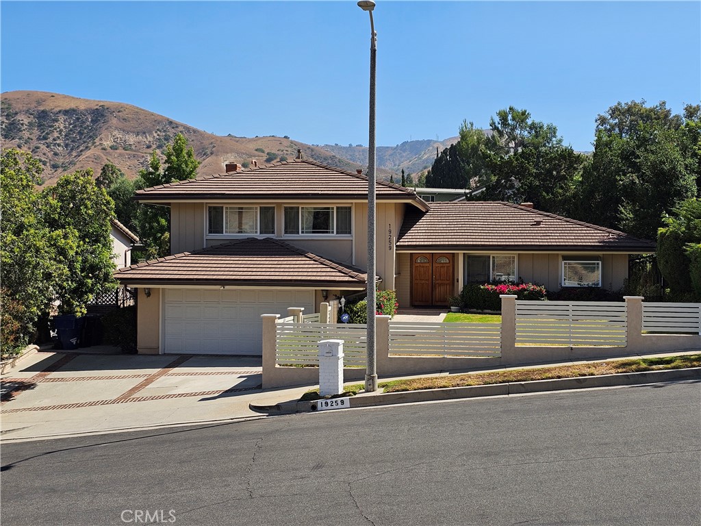 This property is a stunning one-of-a-kind tri-level in the hills of Porter Ranch's most sought after neighborhoods north of Rinaldi! This fabulous home offers 2,492 sqft., 3 bedroom, 3 bath remodeled home is light, bright and move-in ready! Formal living room is enhanced by a fireplace, hardwood floors, double paned windows and adjoining formal dining room. The family's cook will love the spacious remodeled kitchen which has newer appliances granite counter tops, & breakfast area. The huge family room (could be 4th bedroom) is bathed in natural light and offers a wet bar, fireplace, full bathroom and exits to the beautiful backyard. Master suite offers generous sitting area, a gigantic walk-in closet & private remodeled bathroom. Copper plumbing, central air / heat. The private bi-level backyard features a sparkling pool and plenty of hardscape for entertaining. Per LAUSD, Castlebay Elem, Frost Middle School and Granada Hills Charter HS.