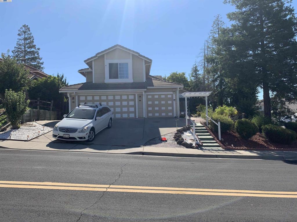 Nice kept 2 story home with 4 bedrooms, 3 full baths, 3 car garage, 1 bedroom and a full bath downstairs on street level, over 2,150 Sq/Ft of living space and almost 7,000 Sq/Ft corner lot. With low maintenance fully landscaped front and back yards comes with fruit trees such as lemon, fig, cherry, grape, apricot, sugar apple, dragon fruit and etc... Within walking distance to Lone Tree Gulf Course and Middle School, minutes to Deer Valley High School, Super Walmart and HWY 4, too much to list just come to see for yourself!