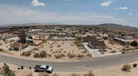 Photo of 6551 Bullion Avenue, 29 Palms, CA 92277 (MLS # JT25167758) Photo of 6551 Bullion Avenue, 29 Palms, CA 92277 (MLS # JT25167758)
