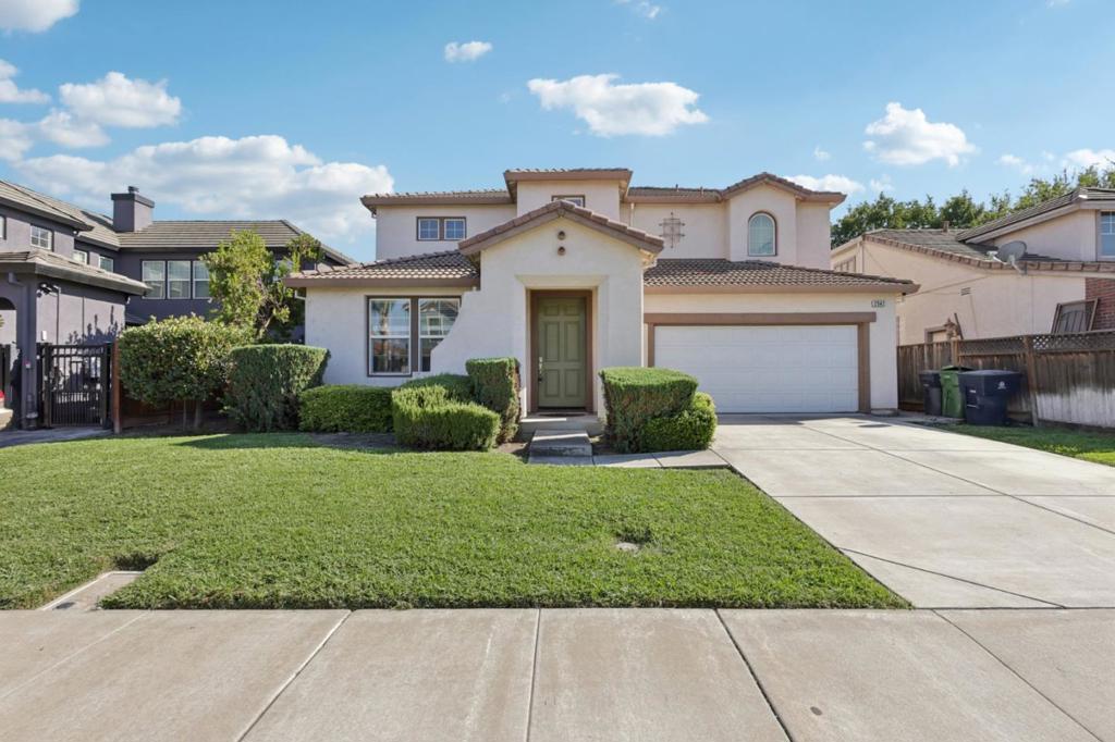 Welcome to this beautiful Spanish-style Laurence Ranch Explorer model in highly desirable West Tracy. This spacious 4-bedroom, 3-bath home sits on a generous lot and offers both comfort and style. Step inside to find fresh new carpet, new interior paint, and an inviting open layout. The gourmet quartz-island kitchen with crisp white cabinetry is perfect for everyday living and entertaining. A bedroom and full bath on the main level provide flexibility for guests, in-laws, or a home office. The light-filled interior feels super clean and move-in ready. Upstairs, the bedrooms are generously sized with great closet space. The backyard is already a great size for entertainingideal for an outdoor kitchen, gatherings with friends and family, or even your dream pool. Situated in a quiet, upscale neighborhood near top schools, shopping, and commuter routes, this home is clean, move-in ready, and waiting for its new owners.