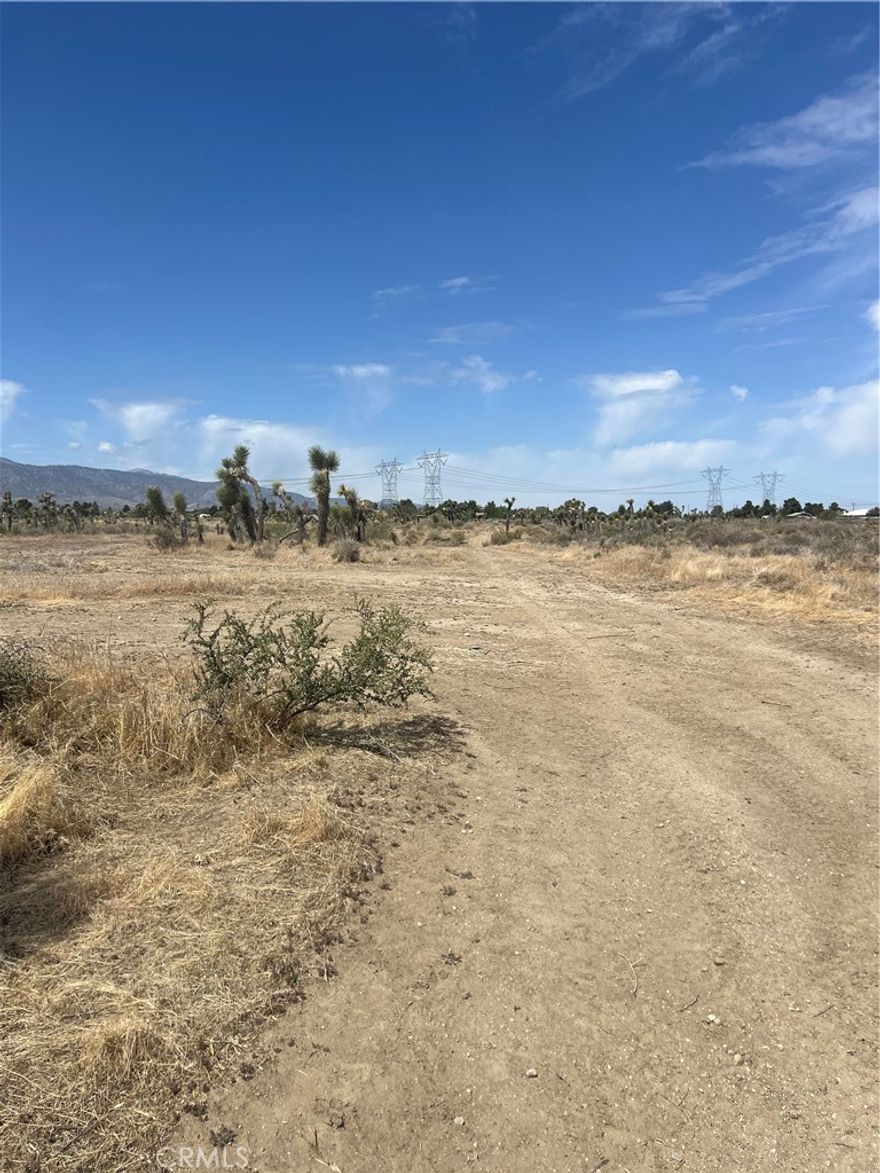 Opportunity Knocks! Vacant 4.18 acres of flat land for sale, it can be a great investment to park your money or for future investment! Zoned RL-5, this property can be used for building a residence, (Check with County). Check for uses and restrictions. 4.18 acres. Utilities nearby there is a well on the site (buyer to verify if it is operating).

Rural Retreat with Investment Potential!

Discover the freedom and possibilities of this 4.18-acre flat parcel, tucked away in a quiet rural area for those craving peace, privacy, and space to grow. Located on a lightly traveled dirt road, this secluded property is surrounded by wide-open landscapes.   Zoned RL-5, it may allow for residential development or other future uses (buyers should VERIFY WITH THE COUNTY for specific zoning regulations & Utilities).  Offering a promising opportunity to build a private retreat, start a homestead, or hold for future appreciation. A rare chance to own land in a truly tranquil, undeveloped setting—come explore the potential!