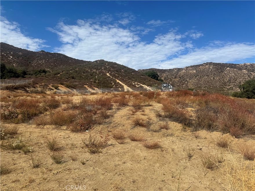 Available Land Lot for you to build your own home.  Just south & close to all the development happening in Canyon Hills.  Your opportunity to let your imagination flow on the possibilities of what could be on this property, plus what the future holds financially for owning land in a growing area.