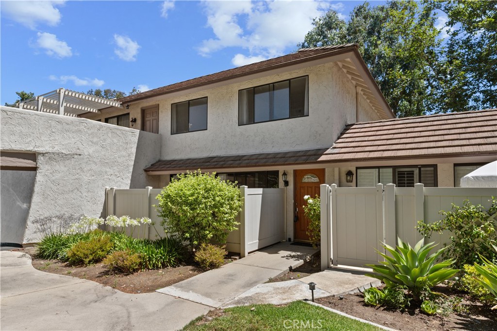 Location, Lifestyle and your new Home in Westlake Village. The lake, grocery store, golf course, dining, farmers market on Sunday and shopping are within a few blocks. The Village Green Community offers two pools, spa, basketball court and a city block of mature-manicured landscaping to enjoy. The home provides an attached two car garage with (full size washer/dryer) direct access into the home, AC, private patio, a spacious ground floor with kitchen, dining area and family room. The second floor provides two bedrooms (each with mountain views) and a full bathroom. Your New Home in Westlake Village.