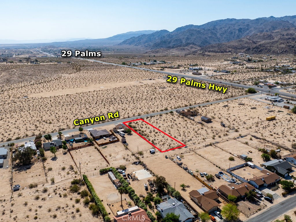 Embrace the great potential of this shovel ready 0.5ac lot in a very desirable neighborhood. This lot is directly fronting paved road and a stone’s throw way from 29 Palms Highway. Power lines are in the back of the lot with gas and water lines in the street. The neighborhood is mostly developed and strategically located about 4 miles to downtown 29 Palms and 9 miles to Joshua Tree National Park. The lot is zoned for RS-4 according to City of 29 Palms. It offers an unique opportunity to enjoy a peaceful desert lifestyle with expansive open spaces and breathtaking natural beauty. Do not miss this opportunity to make your dream come true on this blank canvas. Please note that the boundaries represented in the photos are only an estimation. Buyers should verify boundaries, zoning and utilities, ensuring every aspect aligns with their vision for the property.