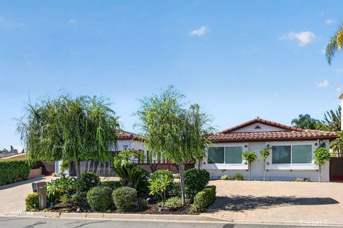 Photo of 5451 Lockhaven Drive #B, Buena Park, CA 90621 (MLS # PW26229903)