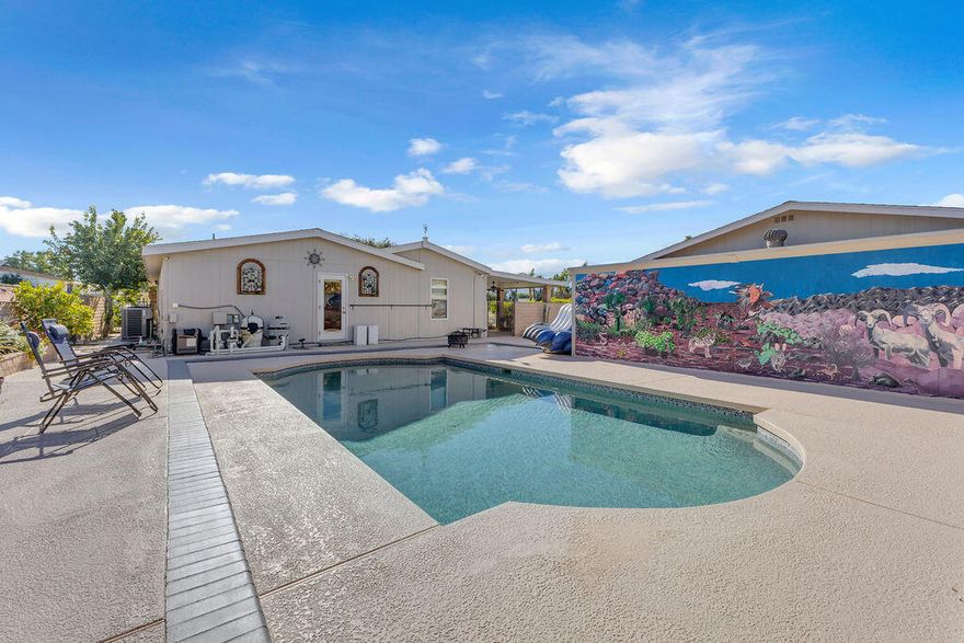 Renovated Corner Lot Oasis in the Gated Community of Ivey Ranch. Set on an expansive 9,583 sq ft corner lot, this beautifully updated 2 bedroom 2 bathroom home offers an ideal blend of comfort, elegance, and resort-style living. Featuring 1,948 sq ft of open, light-filled space, the home has been thoughtfully renovated throughout with high-quality finishes.The inviting open-concept layout connects the kitchen, TV room, and front living area, all enhanced by abundant natural light. The completely remodeled kitchen includes new cabinetry, granite countertops, a spacious island with built-in wine cooler, stainless steel appliances, and an additional kitchen closet. Luxury vinyl flooring extends throughout the home for a modern, cohesive feel.Both bathrooms have been stylishly upgraded, including a spa-like primary suite with a walk-in tiled shower and glass enclosure, double sinks, and new vanities. The guest bath also features a new vanity, sink, and toilet. Additional updates include energy-efficient windows, a newer AC system, updated water heater, new washer and dryer hookups and appliances, and a newly added doorway for direct access to the garage and pool area.Outside, the oversized lot provides exceptional privacy, greenery, and multiple outdoor living spaces. The pool and spa have been fully renovated with new pebble coating, tile work, repainted cool deck, and upgraded motors and spa heater. A custom poolside mural, raised flower boxes, refreshed landscaping, and a dedicated fire pit area create a peaceful, private retreat. Mature trees and privacy hedges help reduce wind exposure.The home also includes walk-in closets, custom built-in cabinetry with glass shelving in the TV area, and large front-facing windows overlooking the manicured lawn. Imperial Irrigation District service provides lower electricity costs.Residents of Ivey Ranch enjoy four pools including two that are heated, tennis and pickleball courts, a nine-hole golf course, small gym, water aerobics, walking paths, cable TV with internet including HBO and Showtime, trash service, street sweeping, guarded entry, and a full-time maintenance team. Ideally located near shopping, dining, and within walking distance to Acrisure Arena with easy access to I-10.