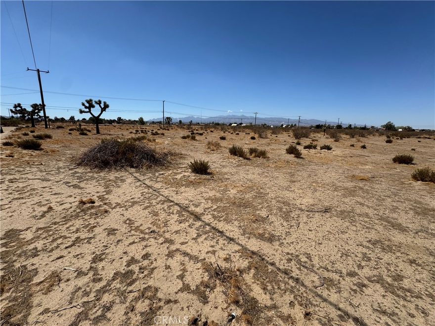 Don’t miss this incredible opportunity to own nearly 2 acres of land in a fantastic commuter-friendly location. This spacious corner lot offers stunning mountain views and endless potential. The property comes with fully approved plans to build your dream home – a beautiful 4-bedroom, 2-bath residence designed with comfort and style in mind. Perfect for buyers looking to build right away or investors seeking a valuable property with future growth potential. Enjoy the combination of wide-open space, convenient access to major routes, and a serene setting surrounded by natural beauty.