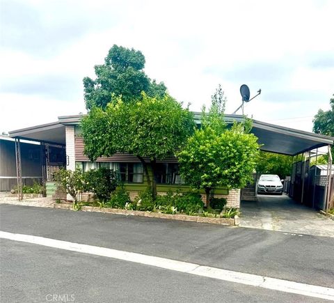 Photo of 12700 Elliott Avenue #406, El Monte, CA 91732 (MLS # RS26051631)