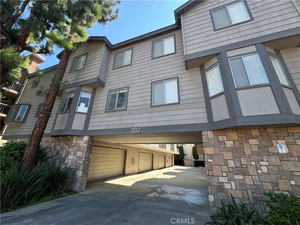 Discover this charming three-story front-unit townhouse in North Glendale, featuring picturesque mountain views from multiple windows. Offering nearly 1,500 sq. ft. of comfortable living space, this home includes two bedrooms and three bathrooms each bedroom with its own private bath for ultimate convenience. The main level boasts a bright living room, a separate dining area, and a kitchen highlighted by granite countertops and a cozy street-viewing nook. The spacious primary suite offers an en-suite bathroom and dual windows framing serene mountain vistas, while the second bedroom also comes with its own private bath. Additional features include recessed lighting, and stylish laminate flooring throughout. A generous two-car garage provides not only parking but also ample space for storage.