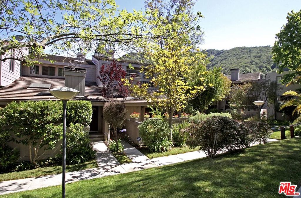 Set amidst the breathtaking natural beauty of the Pacific Palisades Highlands, this extraordinary parcel of land offers a once-in-a-lifetime opportunity to rebuild your dream townhome in one of Los Angeles' most sought-after communities. Formerly home to a stunning 2-bedroom, 2-bathroomtownhome, with an attached garage, in the beloved "Woodies" complex. Overlooking Santa Ynez Canyon, with stunning views. Seller understands that the HOA has ~$570,000 per unit for rebuilding the property. Contact the agent for details.
