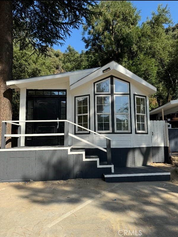 If you love the outdoors and love nature, then you will love Camp Williams. A hidden gem mobile home community tucked away in the San Gabriel Mountains. This quaint 2007 manufactured home has 1 bedroom and 1 bathroom. This unit comes fully furnished. Don't miss out on this opportunity.