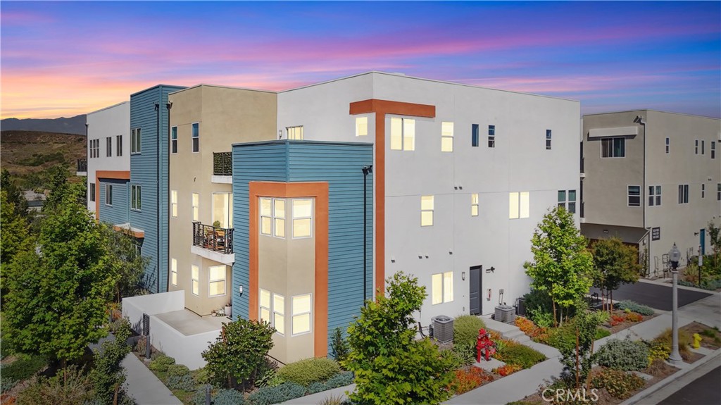 Abundant natural light fills this bright and modern end-unit condo in Irvine’s desirable Solis Park community - offering unbeatable value. With no neighbors above or below, this 3-bedroom, 3.5-bath home features an open-concept layout with high ceilings, luxury waterproof flooring, quartz countertops, stainless steel appliances, and two private balconies. A guest suite on the main level adds flexibility, while the top floor includes a spacious primary suite, additional bedroom, full bath, loft (optional 4th bedroom), and laundry. Smart home upgrades include fully paid solar, QuietCool system, smart thermostat, and central HVAC. Enjoy walkable access to top-tier amenities including resort-style pools, clubhouses, pickleball courts, parks, playgrounds, and scenic trails. Just steps from award-winning Solis Park K-8 and the newest, highly ranked Portola High School. With close proximity to Irvine Spectrum, Wild Rivers, South Coast Plaza, UC Irvine, John Wayne Airport, and Laguna Beach - this is one of the best-priced homes in the area and a rare find in one of Irvine’s most vibrant neighborhoods.