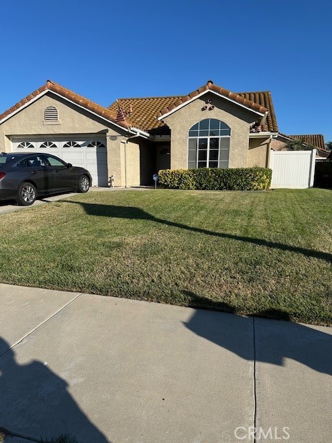 Welcome to this charming and well-maintained 3-bedroom, 2-bathroom home located in a highly desirable neighborhood in Temecula. This residence is a true gem, featuring a fantastic, thoughtfully designed layout that maximizes comfort and flow.
The home showcases a range of appealing features and recent upgrades, including a newly installed white vinyl fence that enhances the property's curb appeal and privacy. The kitchen is both stylish and functional, equipped with sleek stainless steel appliances and elegant Corian countertops.
Step outside to discover a professionally landscaped backyard that offers a peaceful retreat. A unique highlight of this outdoor space is the presence of several producing apple trees, adding both beauty and a special touch to the property.
With its excellent condition, modern amenities, and prime location, this home is a standout opportunity that won't last long. The property is also part of a desirable homeowners' association, which offers a range of community amenities and contributes to the area's pristine maintenance. It is an ideal find for anyone seeking a move-in-ready residence in a sought-after community. Pool, spa and park are directly across the street from this residence.