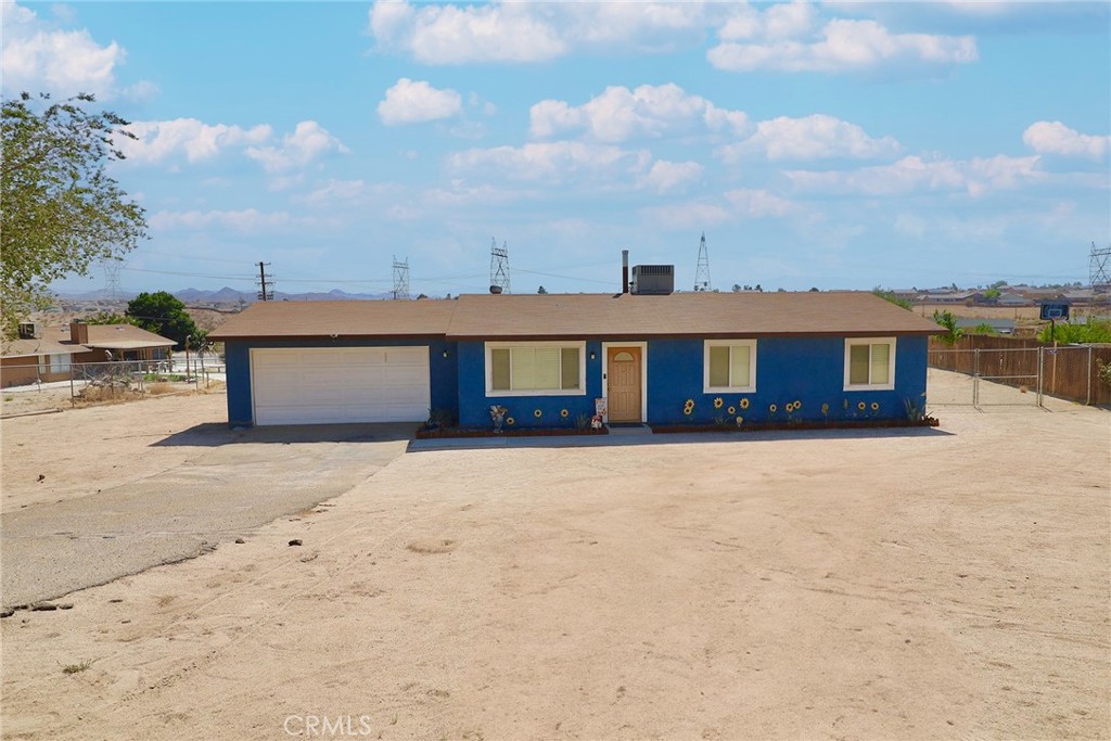Price Just lowered for this Very nice and clean Single Family residence with a lot of potential. Offering a 3 bedrooms and 2 baths, living room and dinning area. Almost 1/2 acre of lot, big eneough to build pool, adu etc. RV space with enough parking Area.