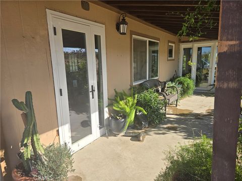 Photo of 57345 Old Haggard Rd, Yucca Valley, CA 92284 (MLS # JT26055594)