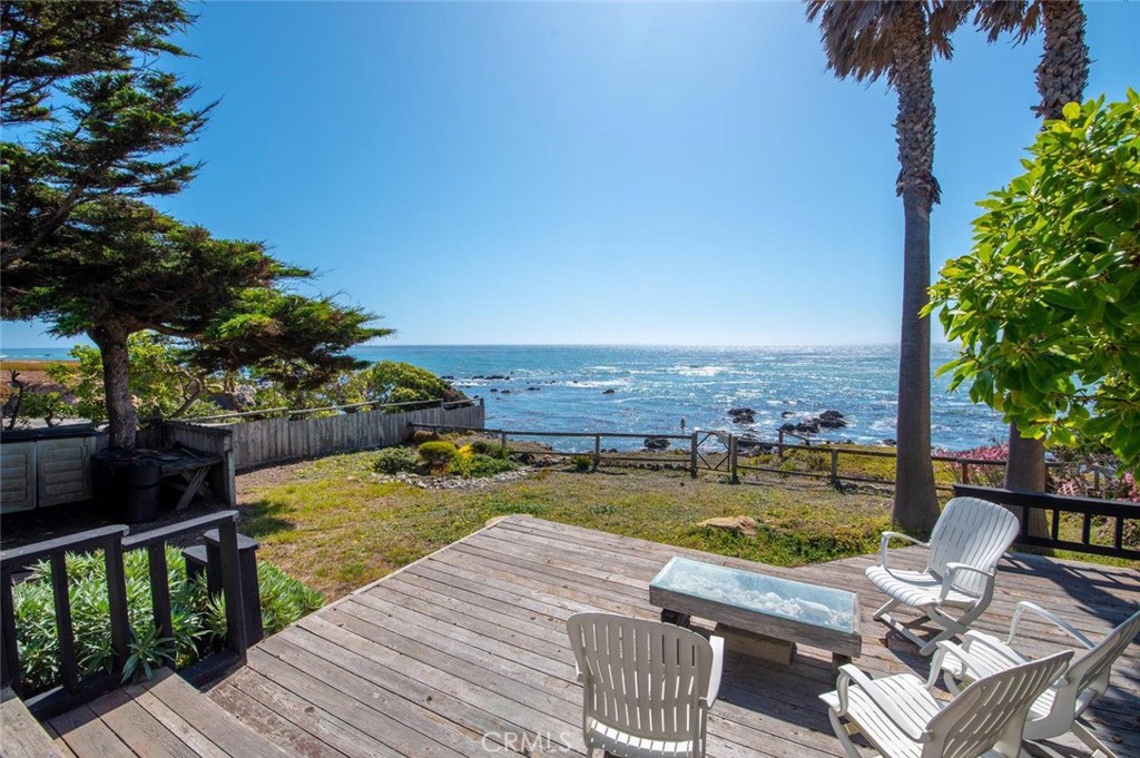 This two bedroom and two bathroom cottage is perched on a bluff over looking the ocean which offers the most incredible views!
This classic home is one of the original cottages built on the oceanfront in the Park Hill neighborhood of Cambria. It is the perfect place for your escape to the Central Coast! This home offers updated wood floors and carpeting for a fresh contemporary feel. Sit on the back deck and enjoy watching dolphins pass by with a local glass of wine at sunset. You cannot beat this fabulous view! The cottage is walking distance to the famed Fiscalini Ranch Preserve and the Moonstone Beach Boardwalk. The location is simply ideal! This really is the perfect place to enjoy the Central Coast!