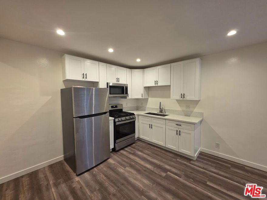 Well maintained 2 bedroom/1 bathroom unit on the ground floor. Appliances include stove, microwave and refrigerator. The asking price includes additional $100 per month for assigned parking space.