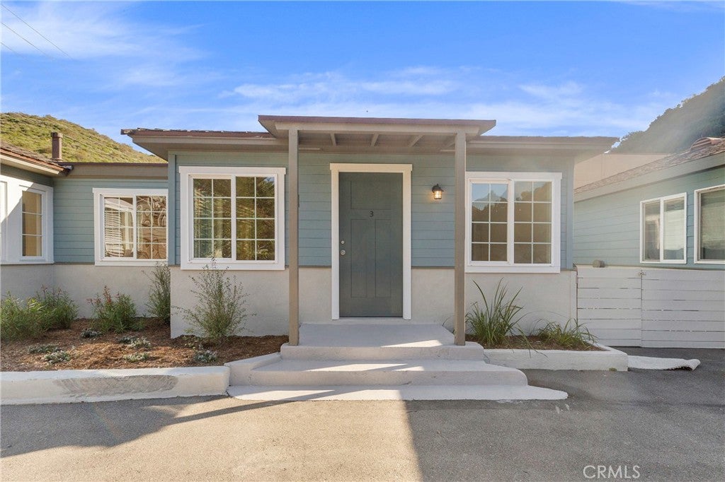 Photo of 2525 Laguna Canyon Rd #3, Laguna Beach, CA 92651 (MLS # LG26216314)