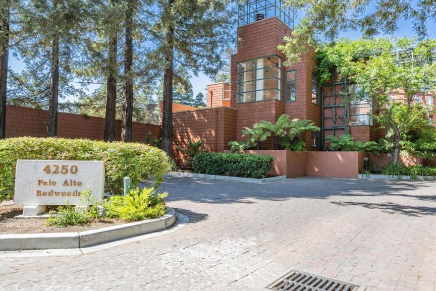 Welcome to your private oasis in the award winning Palo Alto Redwoods community. This home is located on the 1st floor, in a quiet location, surrounded by redwood trees on a lush greenbelt. Enjoy two outdoor patios, one off the primary bedroom and another off the spacious living room. This home has a large kitchen with granite counters, gorgeous natural wood cabinets and a dining area enhanced by floor to ceiling windows highlighting the spectacular view of nature. The bathroom is large with an oversized walk-in shower. Plenty of closet space with an extra storage closet outside the front door and a separate storage room in the secure underground garage next to your two parking spots. There is a security door at the main lobby entrance and elevators from the gated parking garage. Amenities include a pool and clubhouse for entertaining and relaxing. Installation of each AC unit requires prior approval. The Village at San Antonio Center and Whole Foods are convenient shopping. Excellent PA Unified School District, ranked among the best in the United States. Juana Briones, Fletcher Middle and Gunn High are all within walking distance.  Outstanding location near Stanford, Google, Apple, and Facebook. PUBLIC RECORDS SHOW 1 BED, 1 BATH AND A DEN. OTHER OWNERS USED THE DEN AS A BEDROOM.