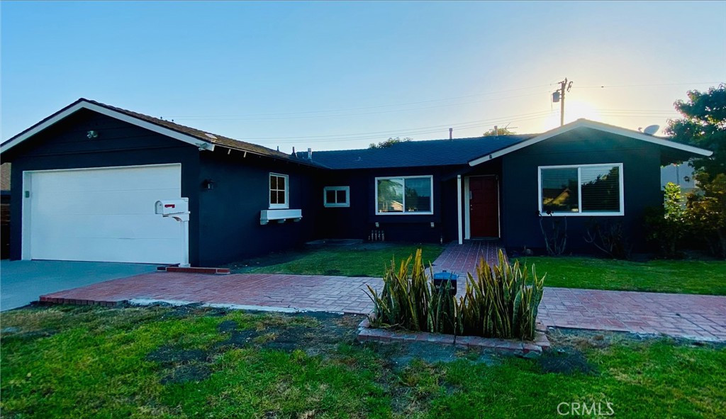 This beautifully updated 3-bedroom home offers an open, airy floor plan with abundant natural light and a relaxed coastal vibe. The modern kitchen features new appliances, updated finishes, and stylish cabinetry, while the bathrooms have been tastefully renovated. New windows enhance the home’s bright and inviting atmosphere. Enjoy the private backyard with a spacious patio and lush grass area, perfect for entertaining, barbecues, or quiet family afternoons. Ideally located within walking distance to award-winning schools, parks, shopping, and dining, and just a few blocks from Huntington Harbour.