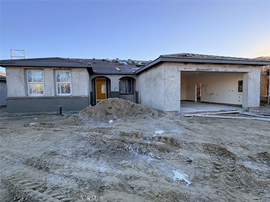 NEW CONSTRUCTION! This new single-level home is ready for modern lifestyles featuring 5 bedrooms. An inviting open-concept floorplan maximizes interior space and features convenient access to a covered patio for effortless entertaining and multitasking. Two bedrooms are situated off the main living area with access to a full bathroom, and two additional bedrooms with a full bathroom are tucked away to the side of the home, including the luxurious owner’s suite with a full bathroom and walk-in closet.

Rancho Descanso is a new community of single-family homes for sale in Desert Hot Springs, CA. The gated community is located within a vibrant city with endless outdoor recreation at the Whitewater Preserve. Desert Hot Springs is known for its hot and cold mineral springs, with several boutique resorts and spas. Residents can take in local landmarks, including the Palm Springs windmills.