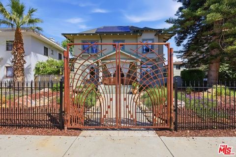 Photo of 2624 Van Buren Place, Los Angeles, CA 90007 (MLS # 26704455)