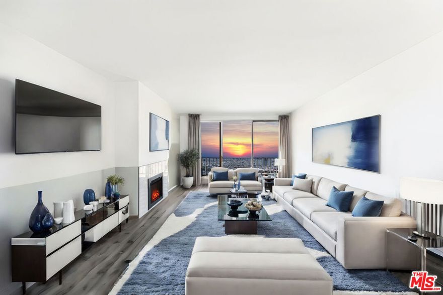 Stunningly remodeled penthouse with abundant natural light and peek-a-boo ocean vistas, nestled in the vibrant heart of Santa Monica just moments from the chic boutiques of Montana Avenue. This rare corner unit boasts 2 bedrooms and 2 bathrooms, each offering expansive views of both the coastline and mountains. The modern gourmet kitchen is a chef's dream, featuring quartz countertops, stainless steel appliances, bespoke shaker cabinetry, and a convenient breakfast bar that seamlessly connects to the dining area. Throughout the condo, you'll find elegant light gray flooring complemented by a pristine white tiled fireplace. Indulge in luxury within the master bathroom, which showcases custom vanities, a sumptuous bathtub, and a separate glass door shower. With only a block separating you from the bustling shops and dining options of Montana Avenue, and mere minutes from Palisades Park, Third Street Promenade, and the beach, convenience and leisure are at your fingertips. Additional amenities include two side-by-side parking spaces, a recreational room, hot tub, and sauna, ensuring a lifestyle of both comfort and indulgence.